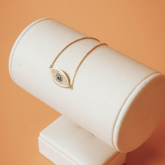 Pulseira Olho Grego com Safira Grande Azul, 10 Pedras Negras e 36 Brancas Importadas 20cm em Ouro 18k