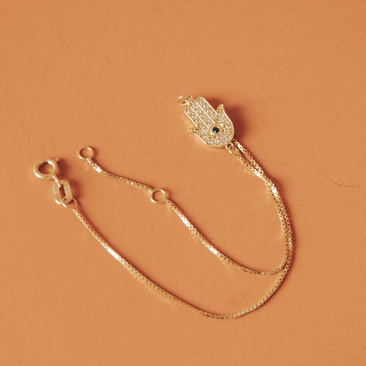 Pulseira Mão de Fátima com Safira e Pedras Brancas Sintéticas 20 cm em Ouro 18k