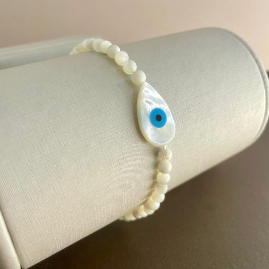 Pulseira de Espinelo com Olho Grego Gota e Madrepérola – Proteção e Estilo em Cada Detalhe